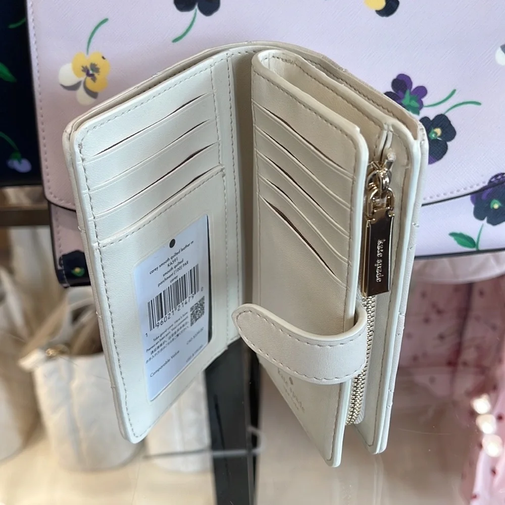Kate Spade Carey Medium Compartment Bifold Wallet  COLOR: Parchment